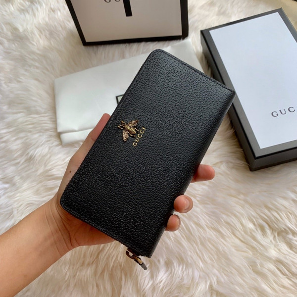 G*u*i leather zip around wallet