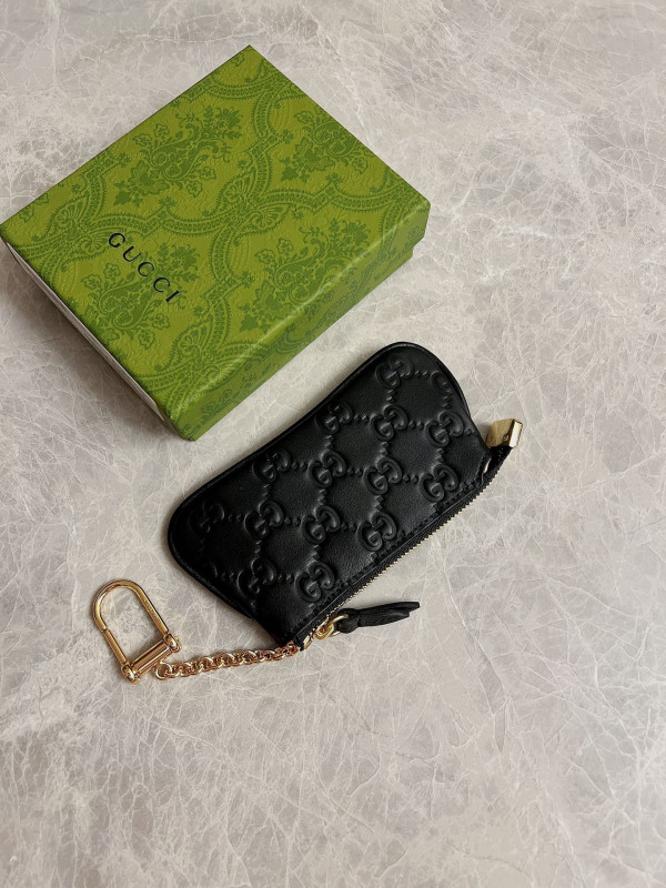 G*u*i signature key case