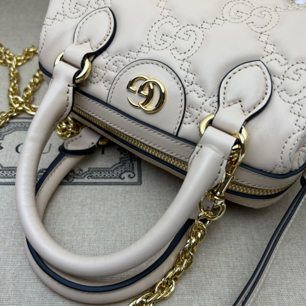 G*u*i gg matelassé leather top handle bag
