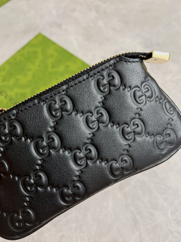 G*u*i signature key case